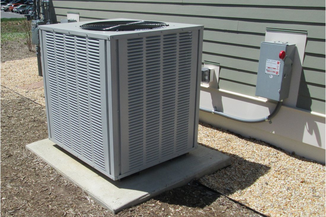 An air-conditioning unit outside a building